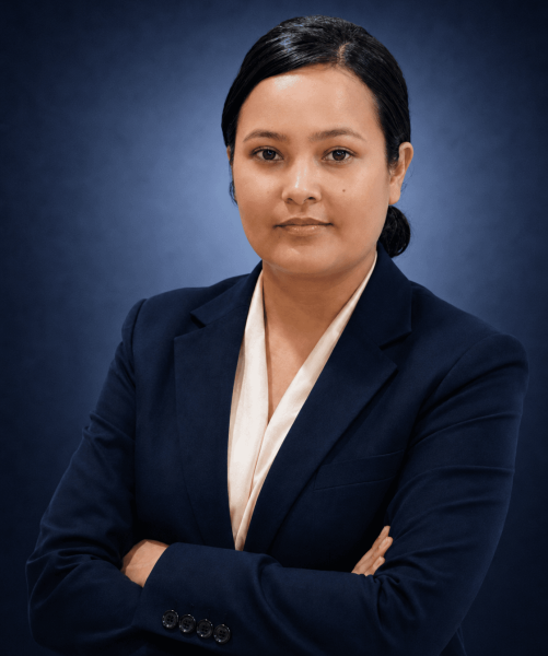 Sapana Bhandari, Legal Manager at Emigrate Lawyers, in professional navy attire.